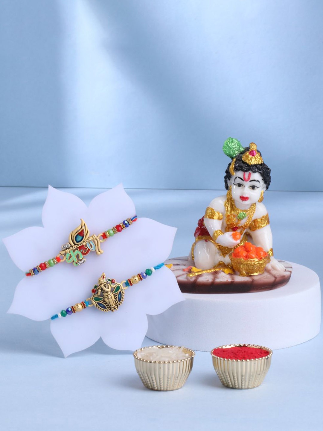 

Floweraura Set of 3 Rakhi With Lord Bal Gopal Krishna Idol & Roli Chawal, Green
