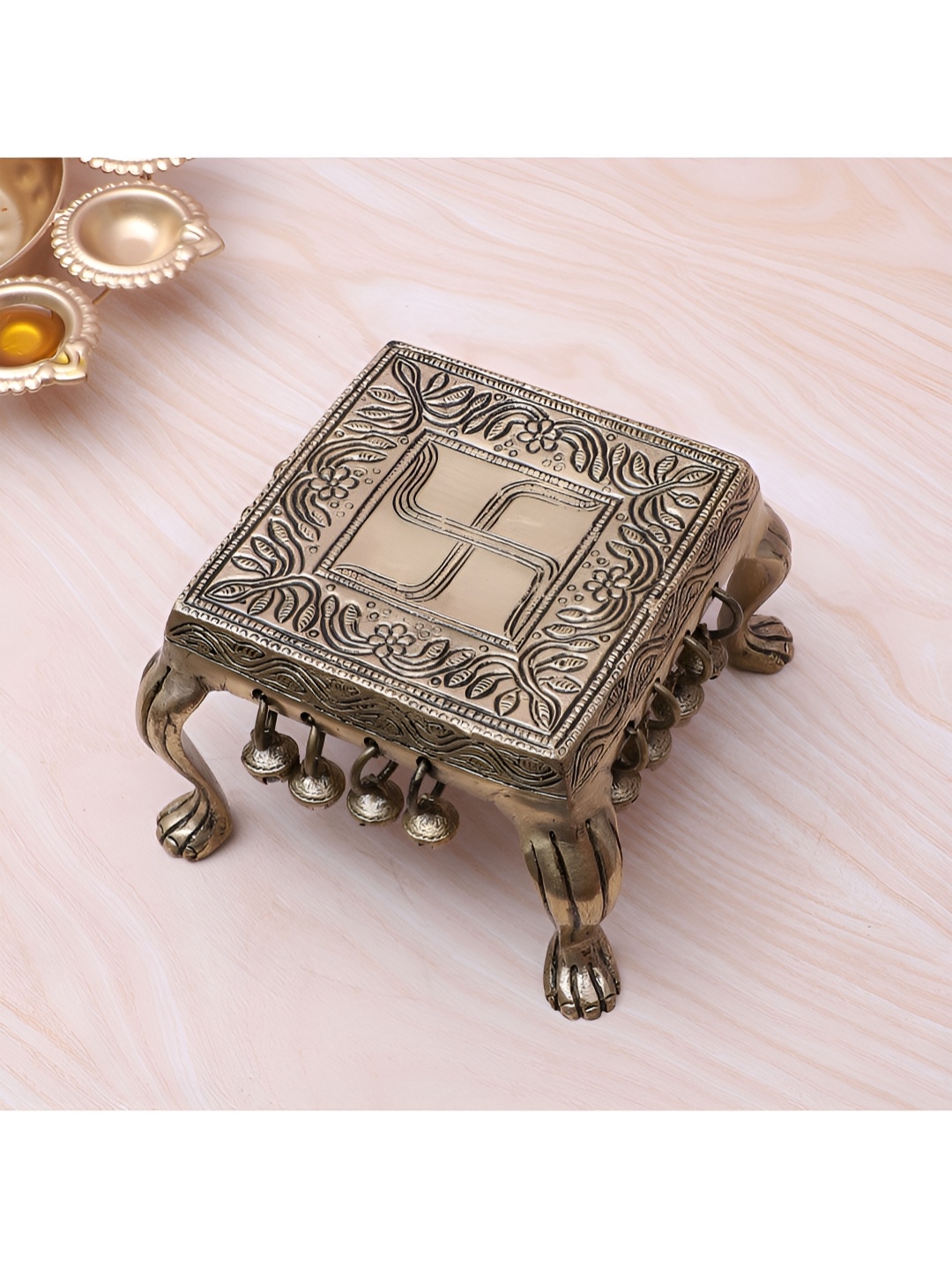 

Two Moustaches Brown Swastika Engraved Brass Pooja Chowki