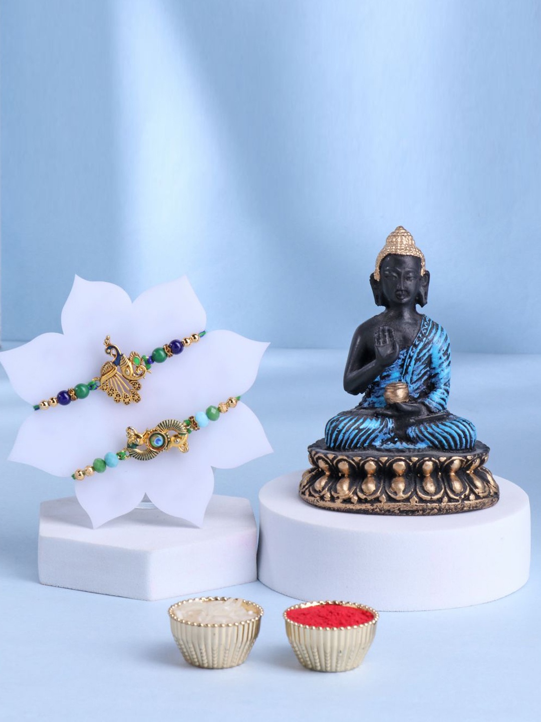 

Floweraura Set of 3 Beaded Rakhis With Lord Buddha Idol & Roli Chawal, Blue