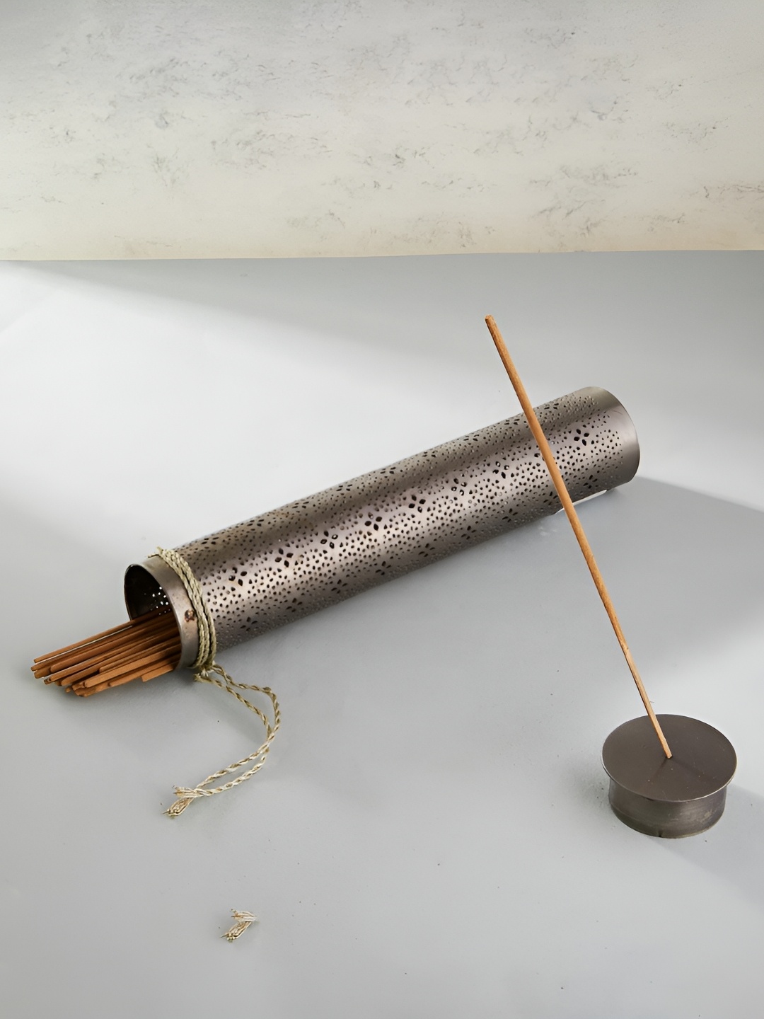 

Fabindia Silver Toned Akha Neroli Cutwork Metal Incense Stick Holder