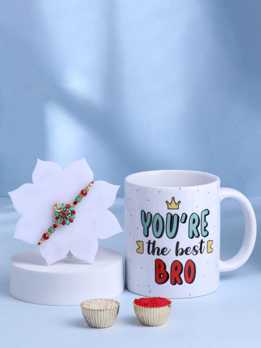 

Floweraura Set of 2 Beaded Rakhi With Mugs & Roli Chawal, Red
