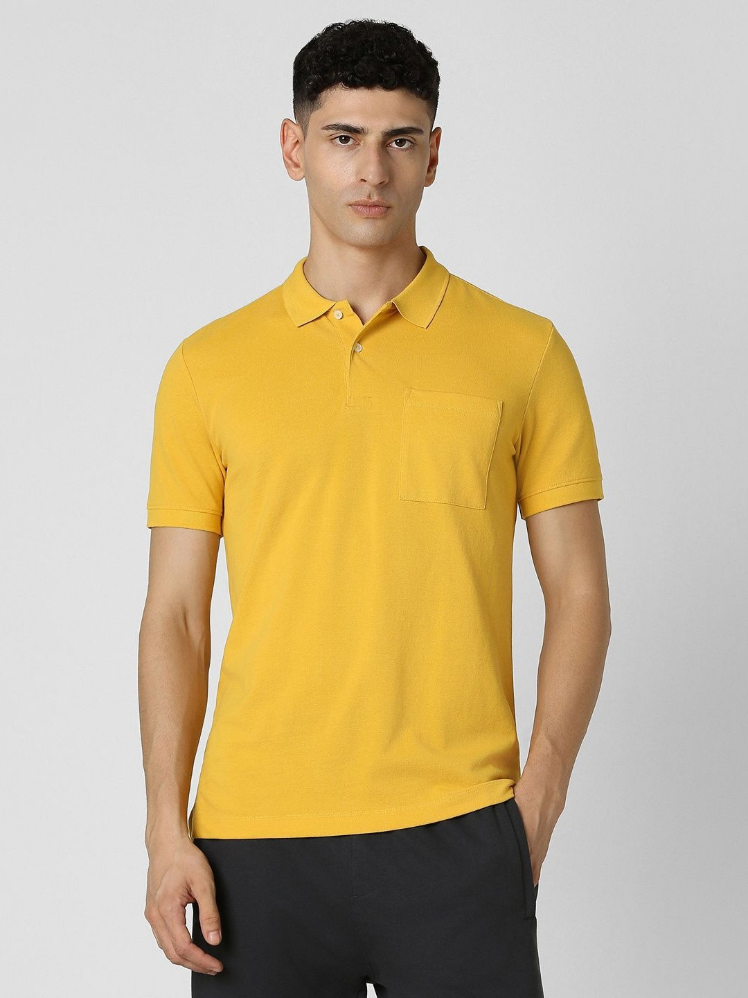 

Van Heusen Flex Men Solid Polo Collar T-shirt, Yellow
