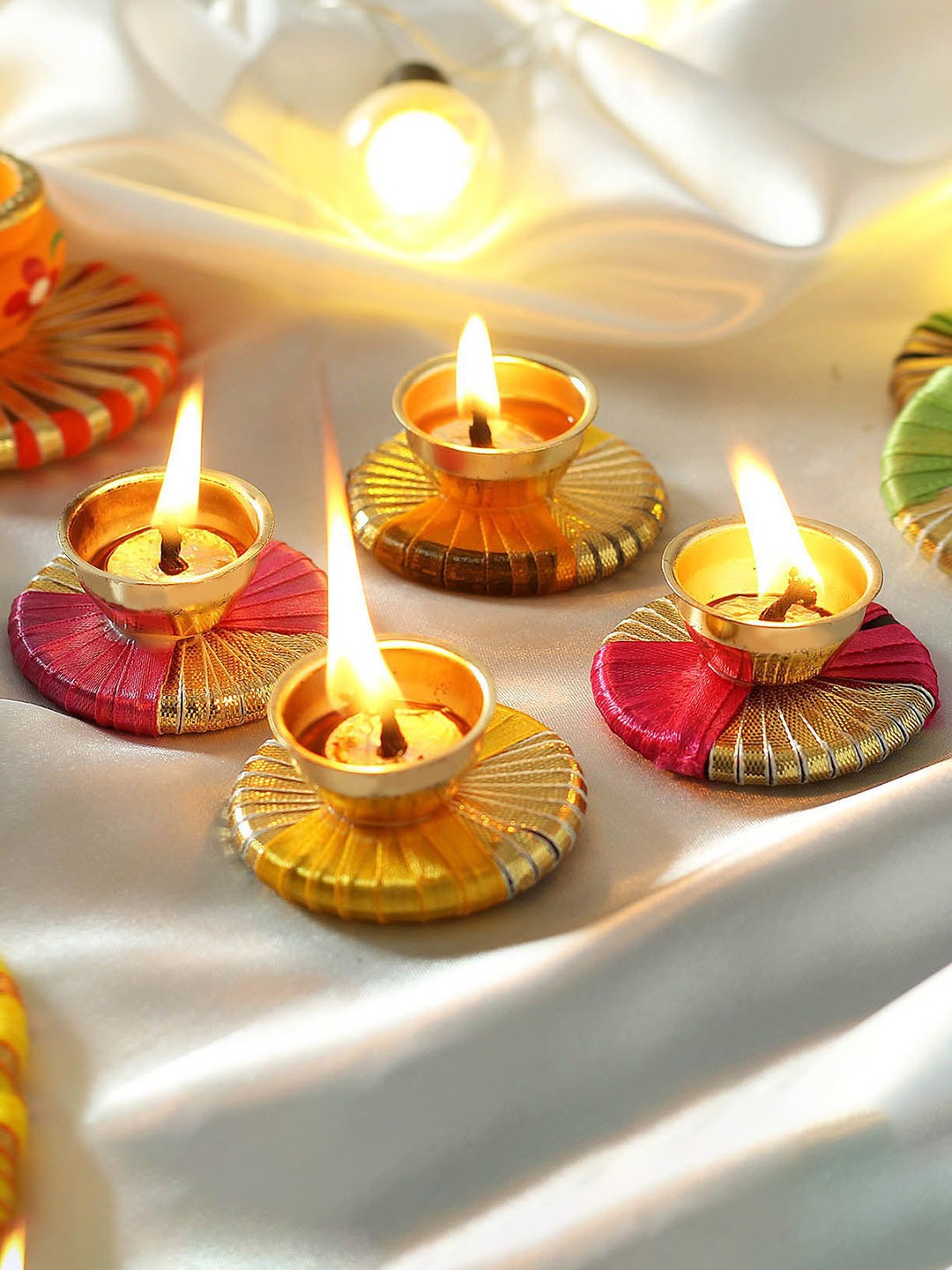 

IGP 4Pc Yellow Metal Diyas