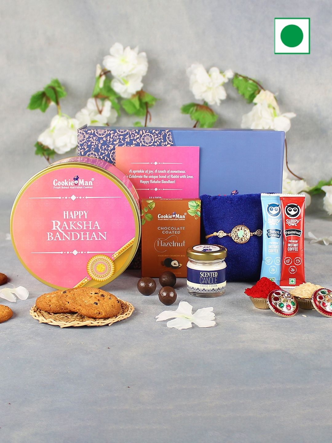 

Cookieman Set Of 3 Rakhi with Cookies & Chocolate Gift Hamper, Blue