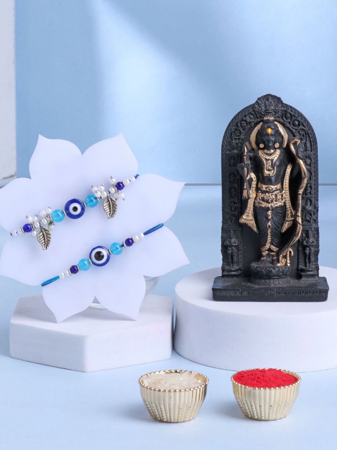 

Floweraura Set of 3 Beaded Rakhis With Lord Ram Idol & Roli Chawal, Blue