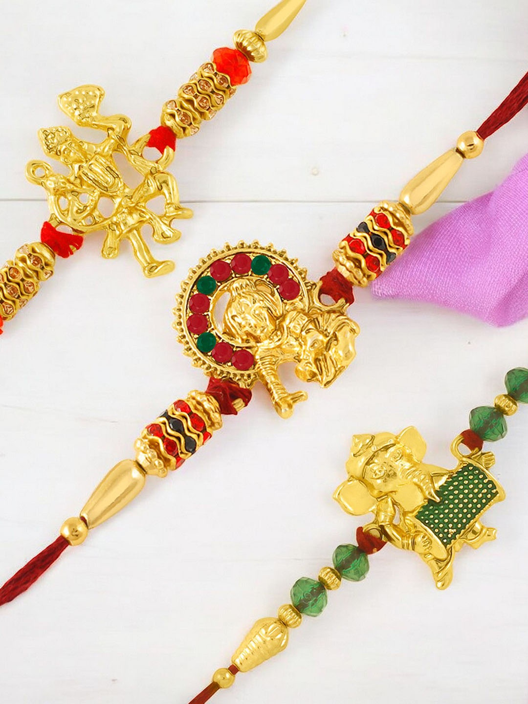

Okos Set Of 3 Hanuman Krishna And Ganesha Thread Rakhi, Gold