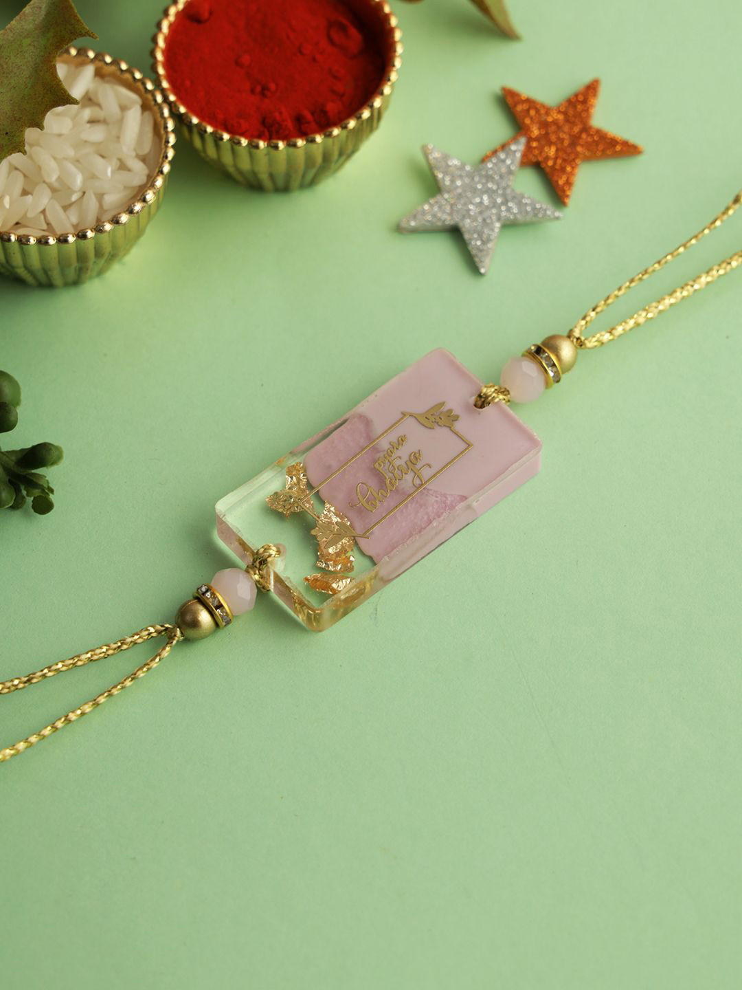 

Sangria Beaded Thread Rakhi with Roli Chawal & Greetings Card, Cream