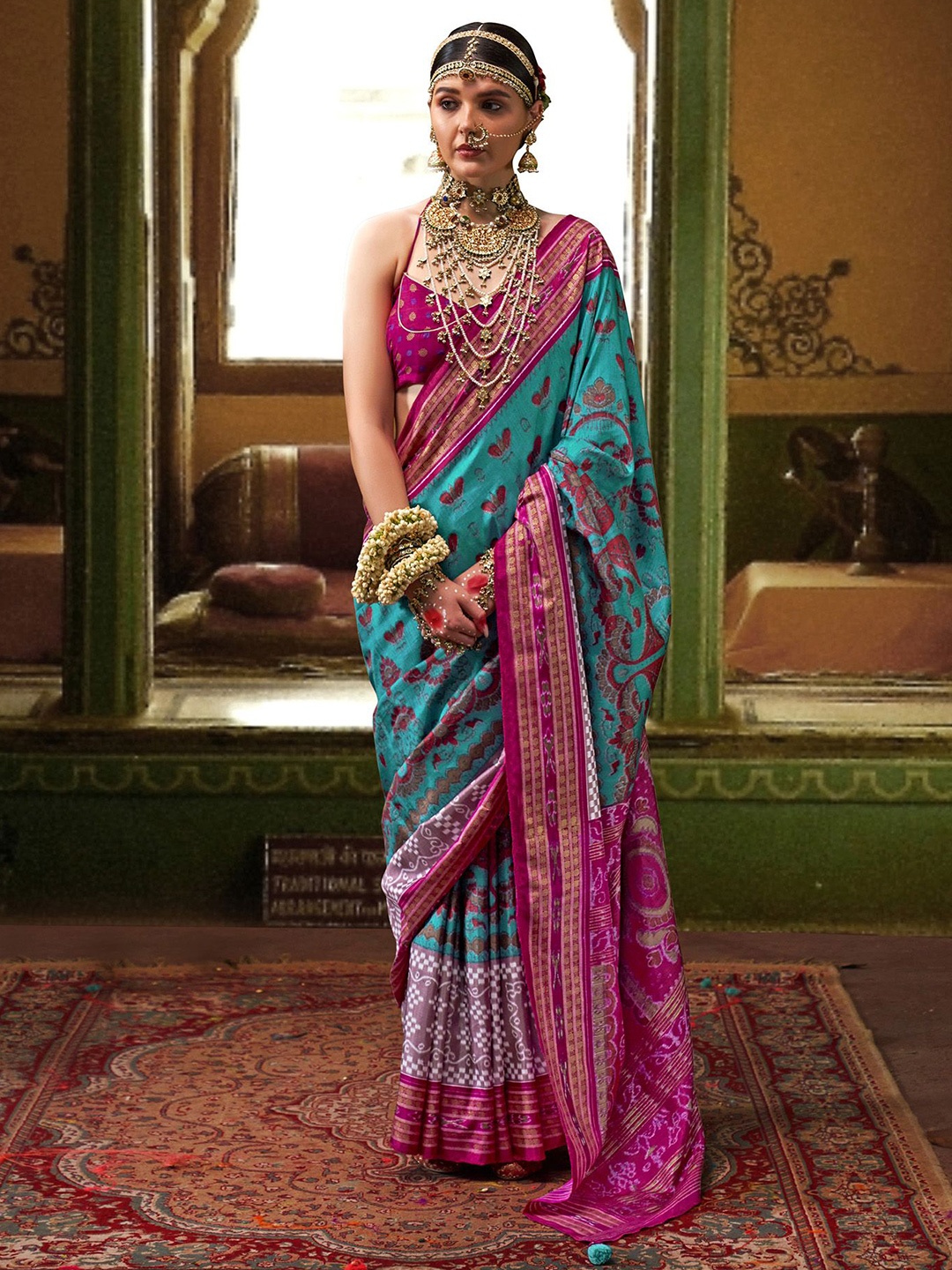 

elora Woven Design Zari Patola Saree, Turquoise blue