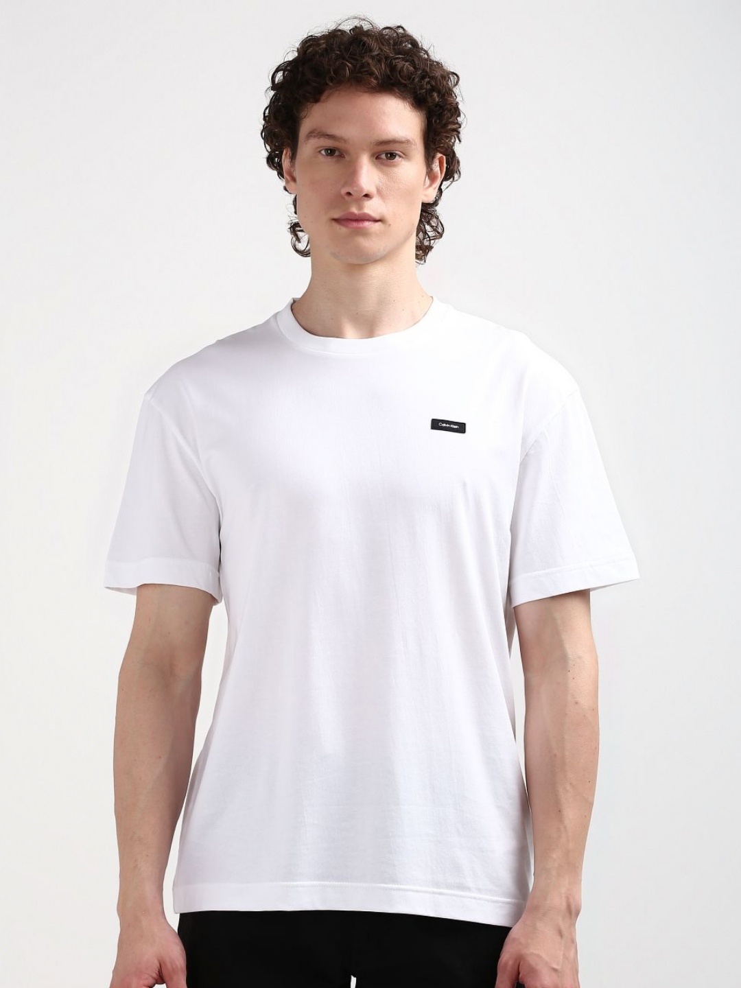 

Calvin Klein Jeans Men Solid Round Neck Pure Cotton Relaxed Fit T-shirt, White