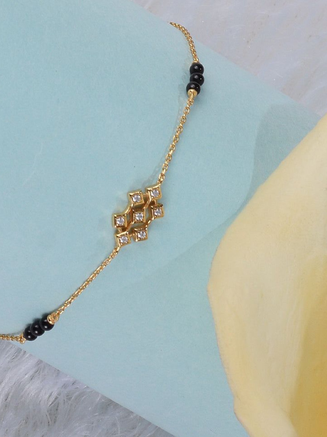 

PALMONAS Sleek Gold-Plated Stone Studded Link Bracelet