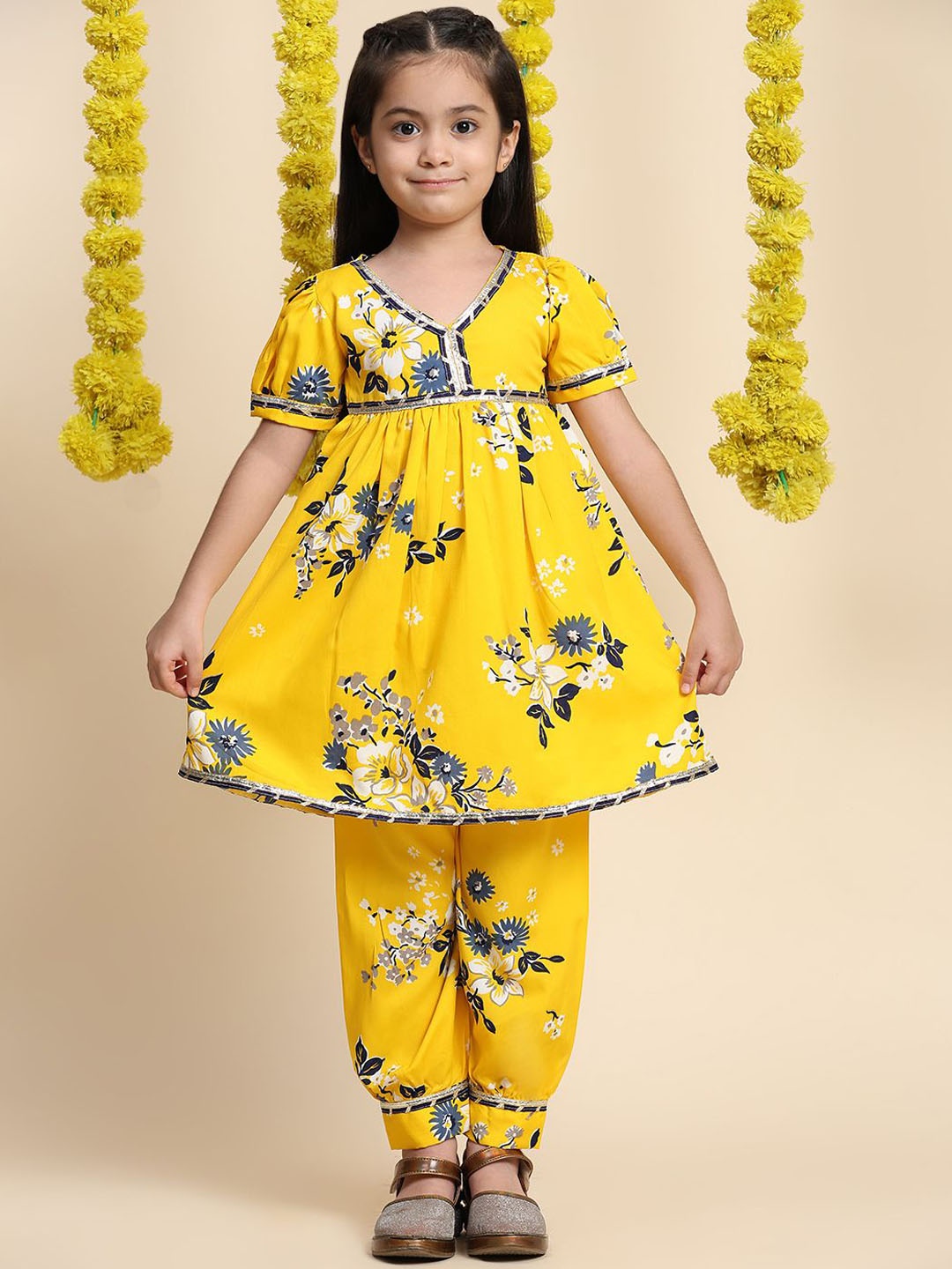 

Cutiekins Girls Floral Printed Puffed Sleeves Empire Gotta Patti A-Line Kurta With Salwar, Yellow