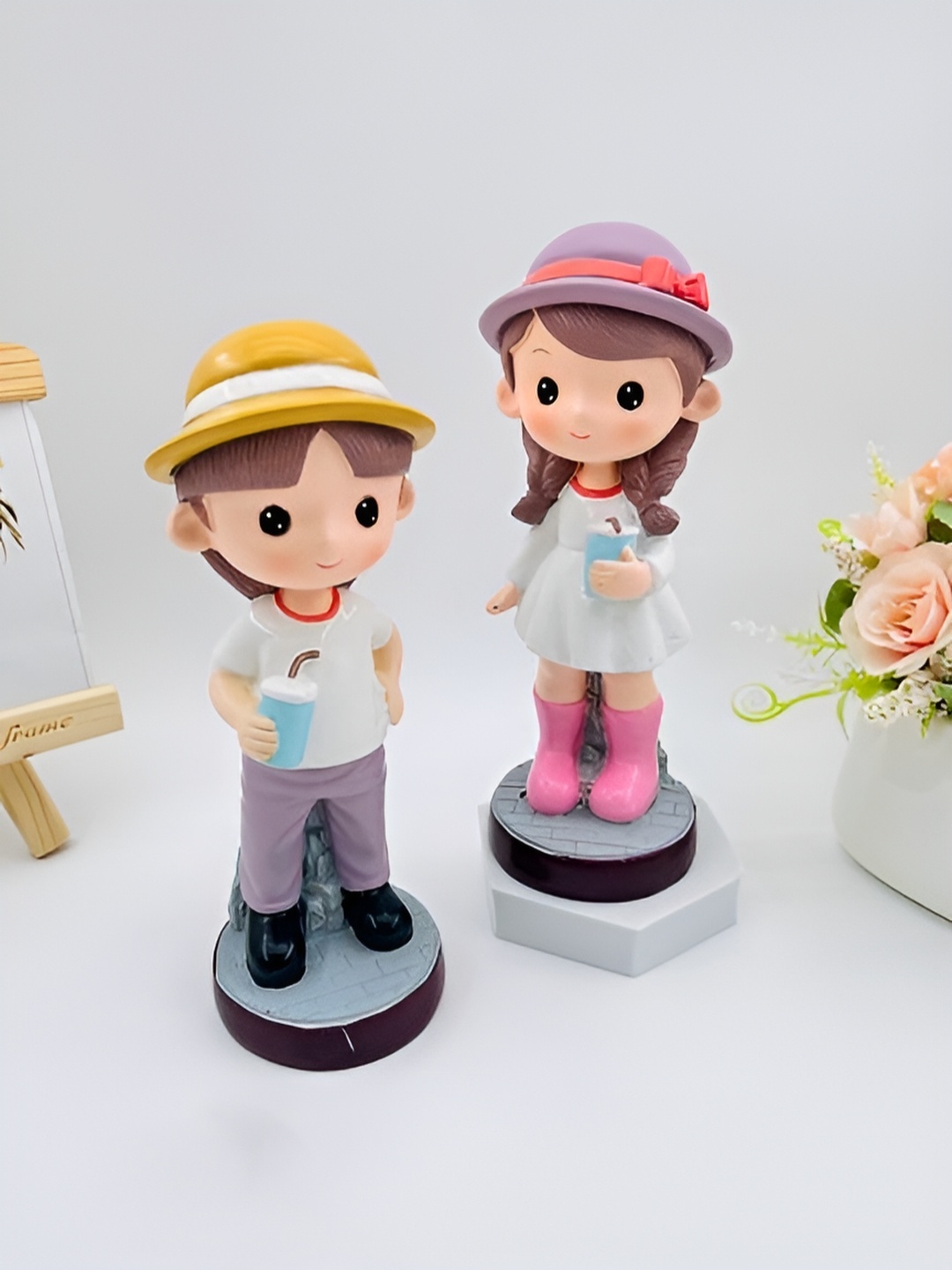 

Elegant Lifestyle White & Pink 2 Pieces Figurine Showpiece