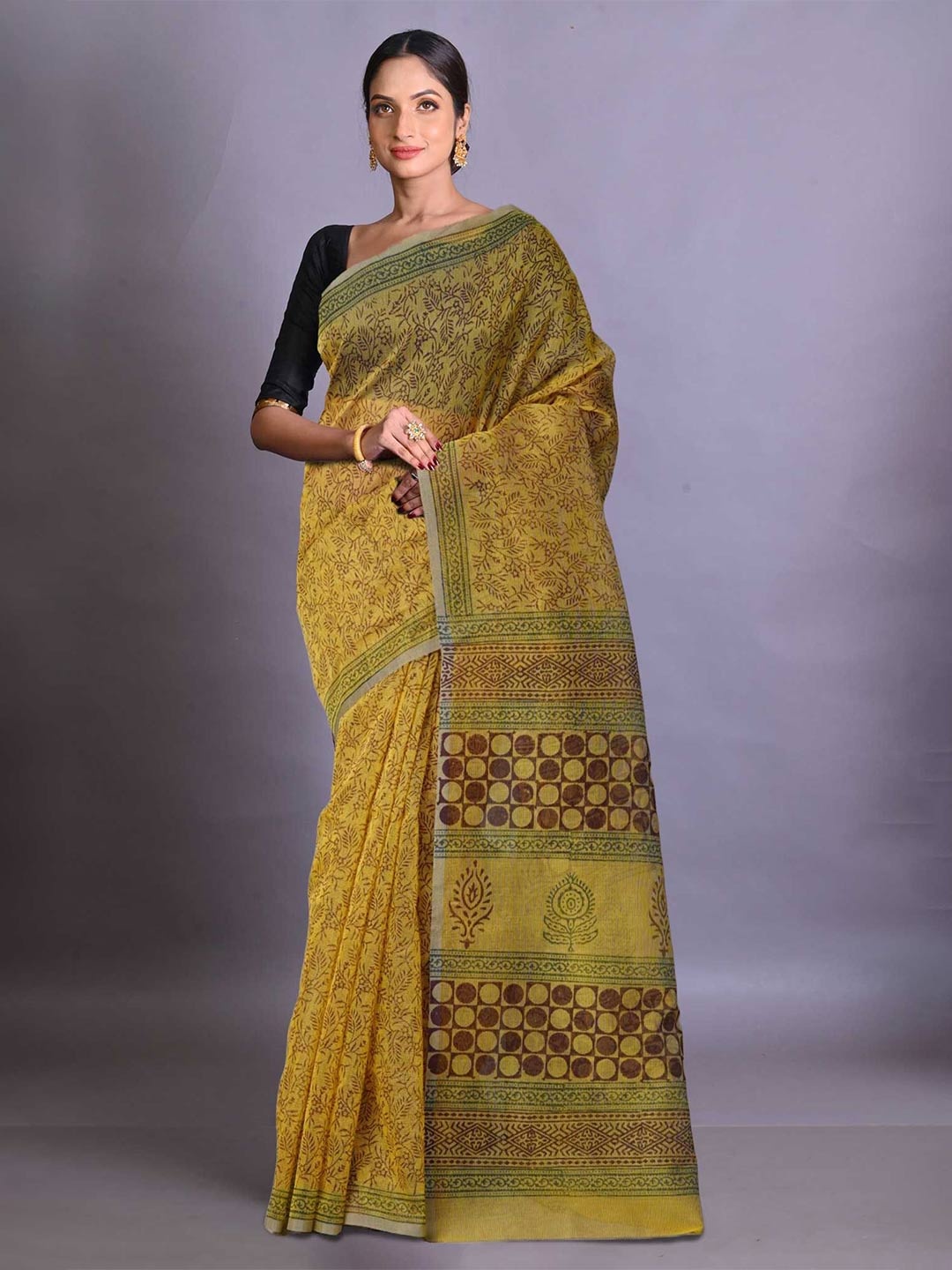 

Unnati Silks Ethnic Motifs Supernet Handloom Block Print Saree, Yellow