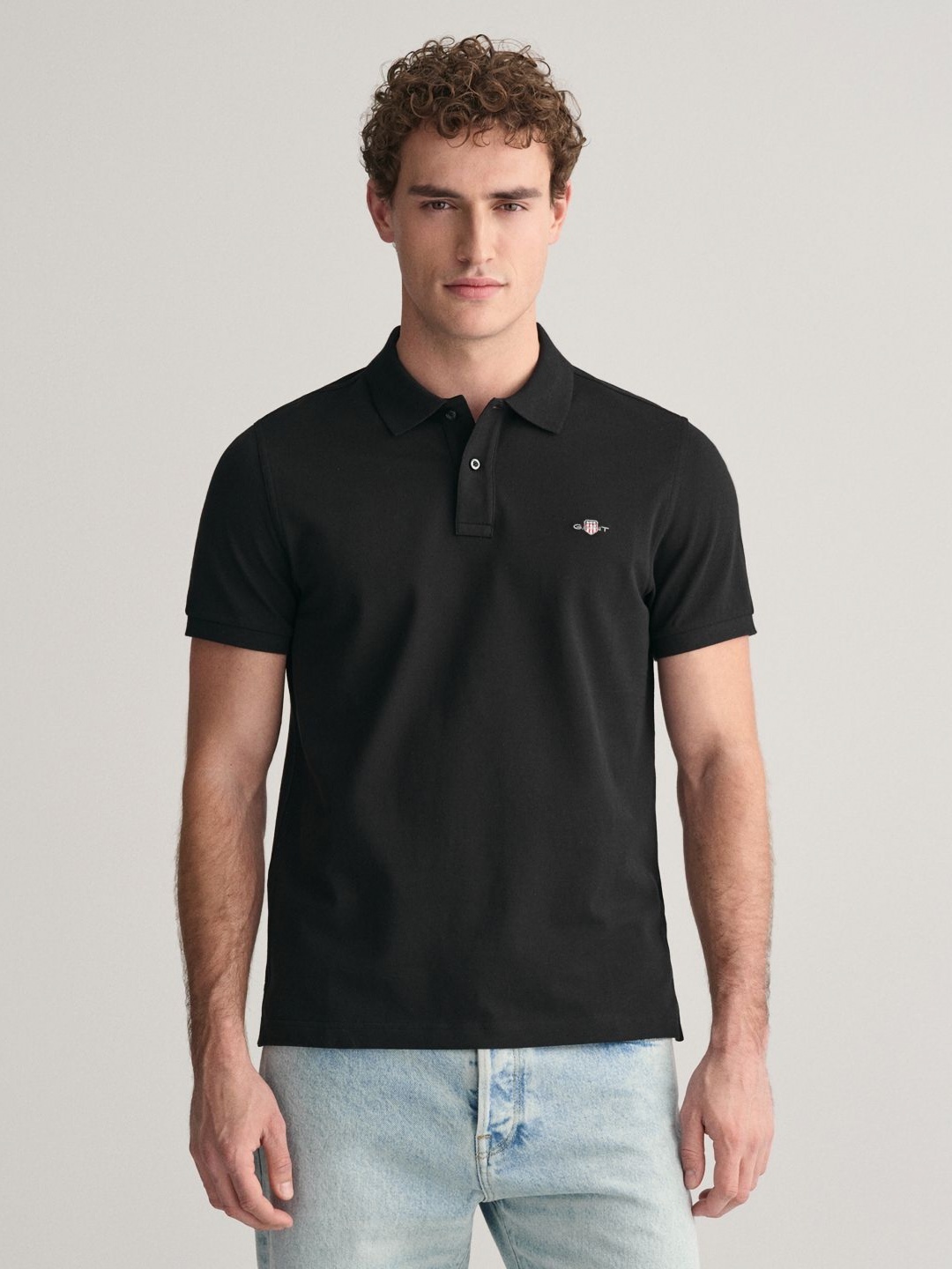 

Gant Men Solid Collared Short Sleeves Polo T-Shirt, Black