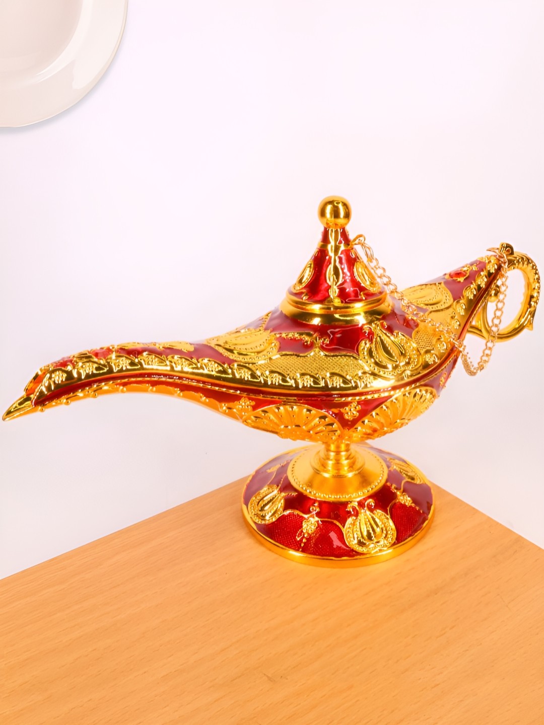 

Elegant Lifestyle Vintage Aladdin Chirag Red & Gold-toned Medium Metal Showpiece