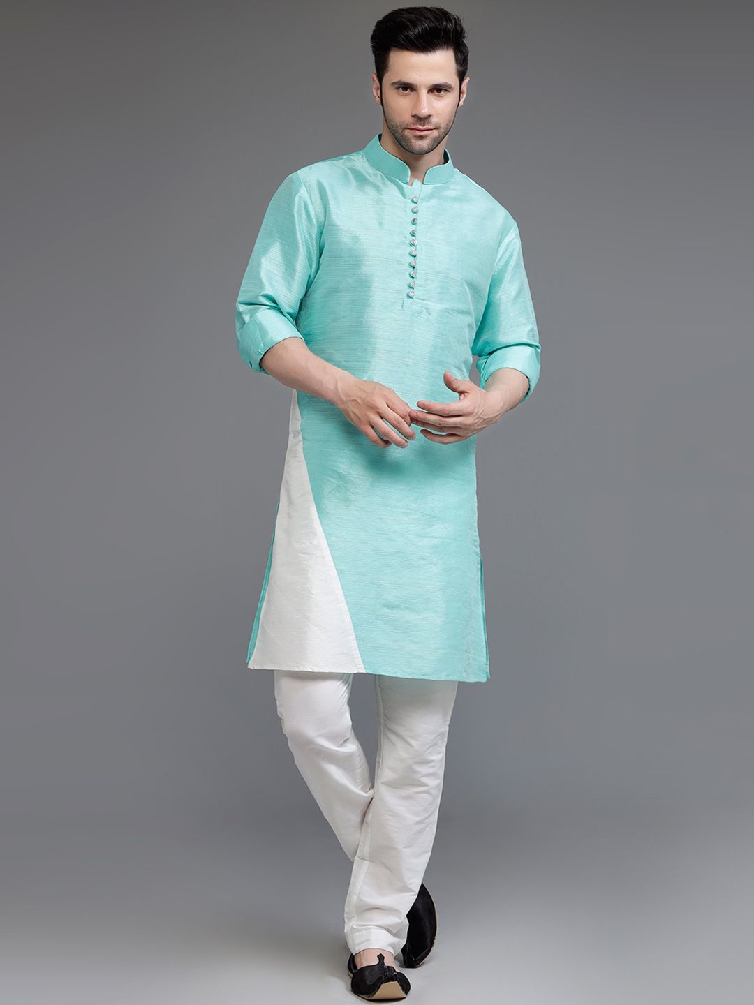 

Utsav Fashion Colourblocked Mandarin Collar Dupion Silk Kurta With Trousers, Turquoise blue