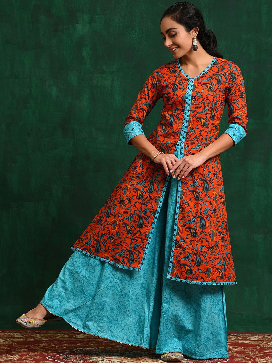 

Sangria Red Paisley Printed V-Neck Mirror Work A-Line Kurta With Palazzo, Orange