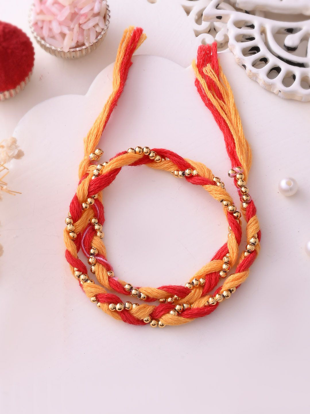 

Aapno Rajasthan Beaded Rakhi With Roli Chawal & Greeting Card, Gold