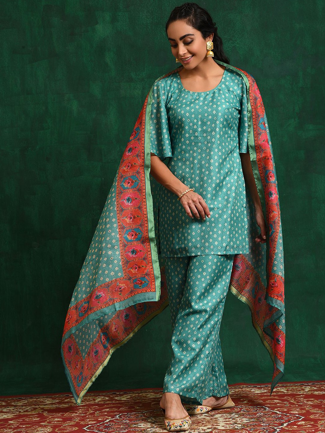 

Sangria Green Bandhani Printed Flared Sleeves Straight Kurta With Palazzo & Dupatta