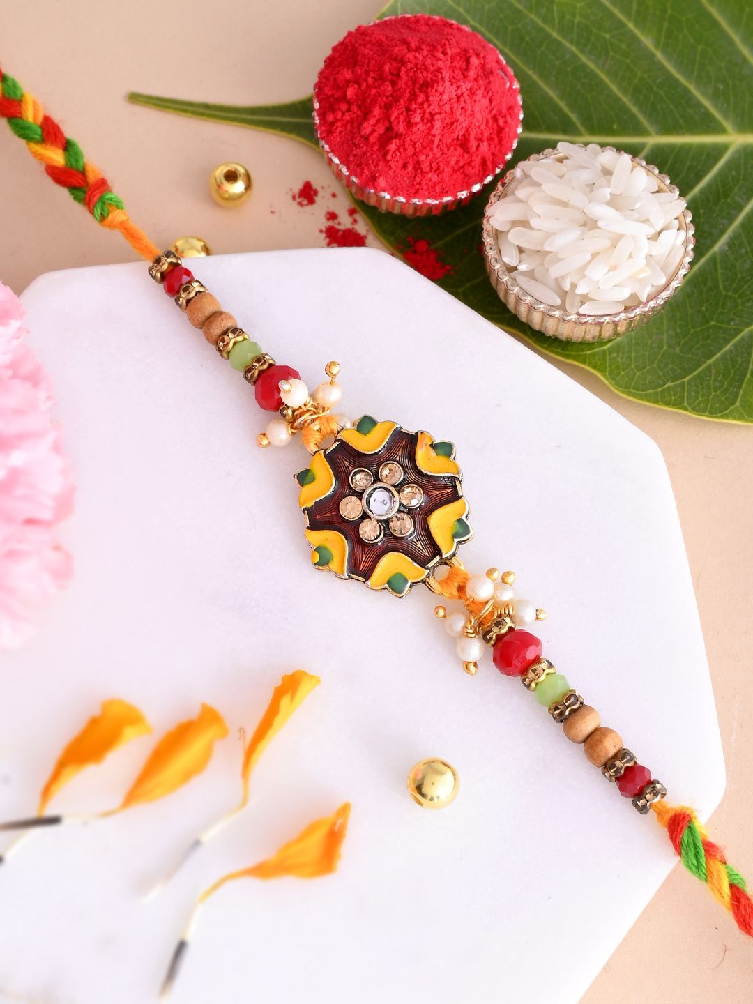 

Anouk Green Stone Studded & Beaded Thread Rakhi With Roli Chawal With Greeting Card, Brown