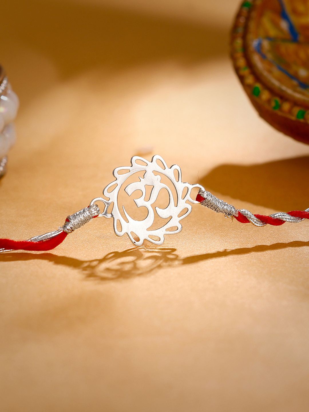 

GIVA 925 Silver Classic Om Charm Thread Rakhi With Roli Chawal & Greeting Card