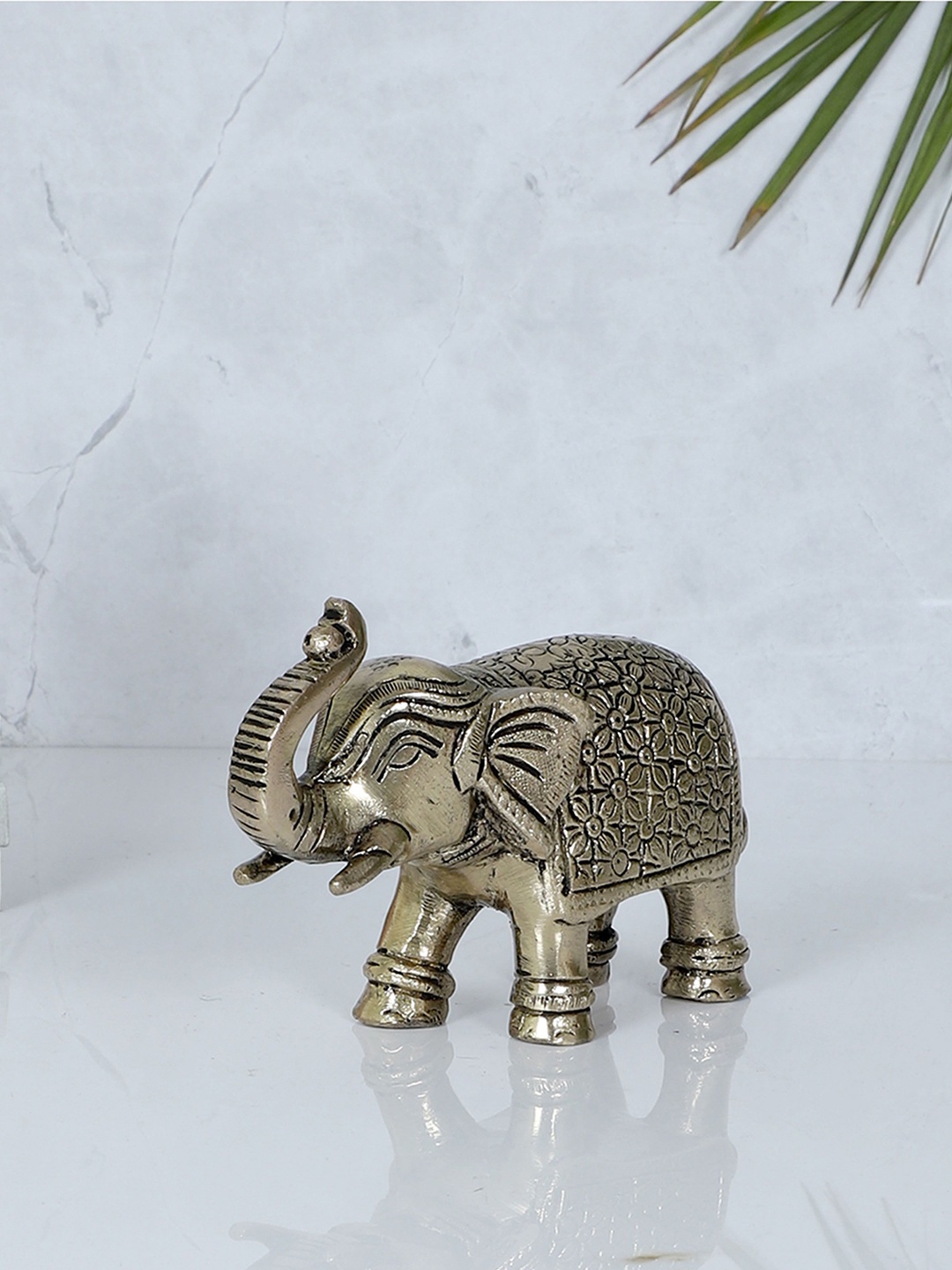 

Two Moustaches Gold-Toned Carved Elephant Small Brass Figurine Showpiece