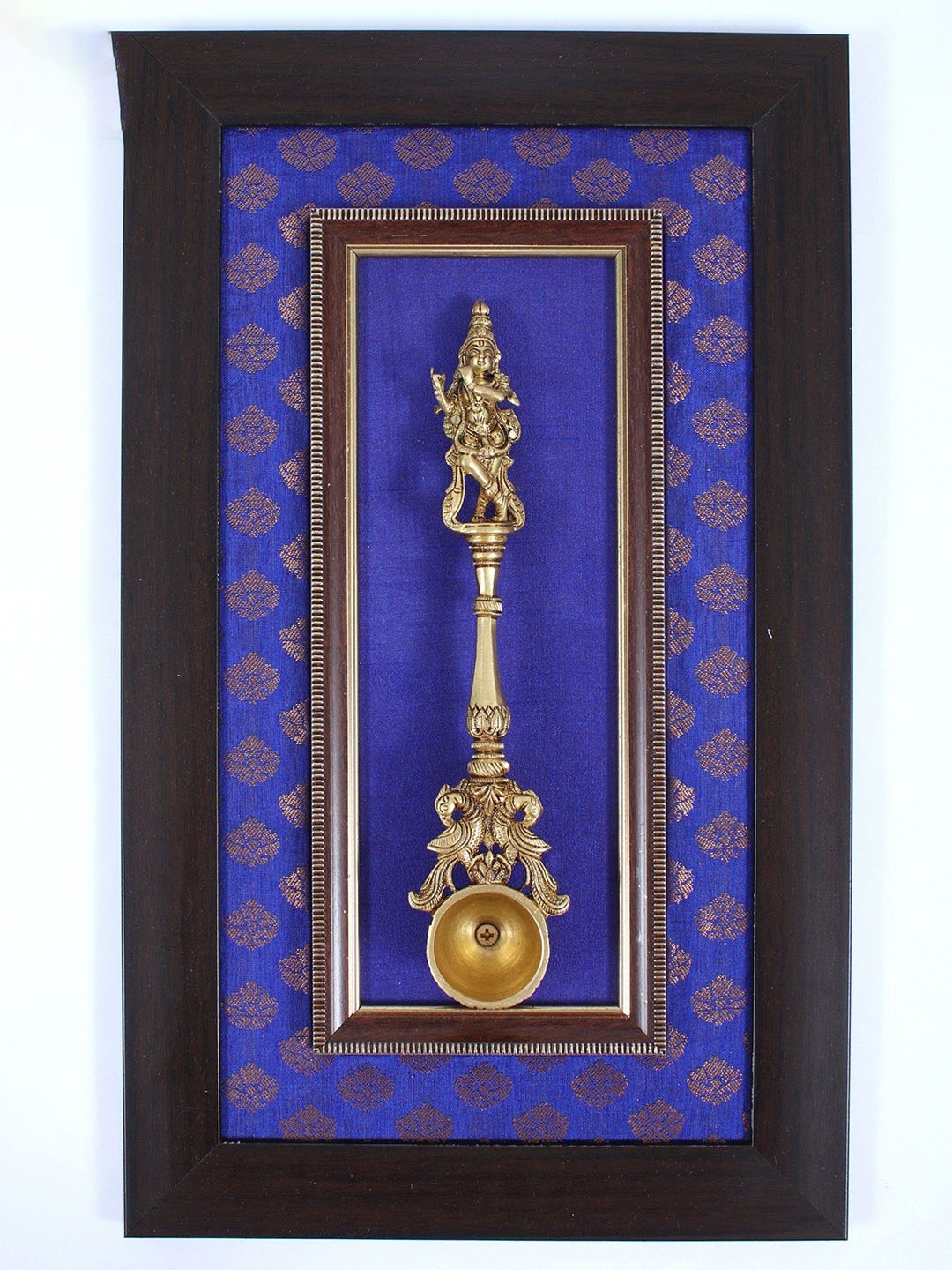 

Exotic India 17" Wooden Framed Lord Krishna Ritual Spoon in Brass Wall Hanging, Gold