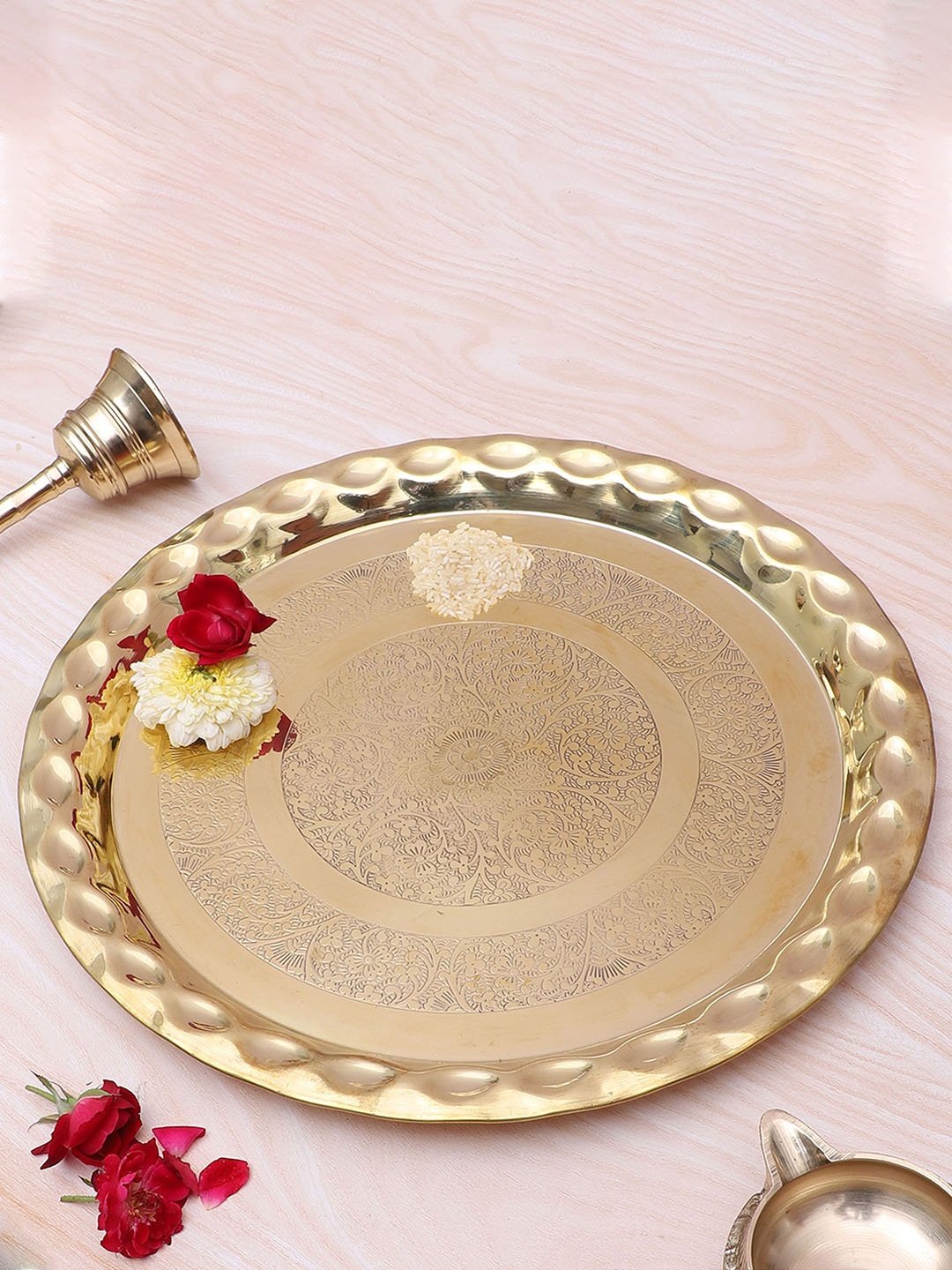 

Two Moustaches Gold Toned Floral Carved Textured Brass Pooja Thali