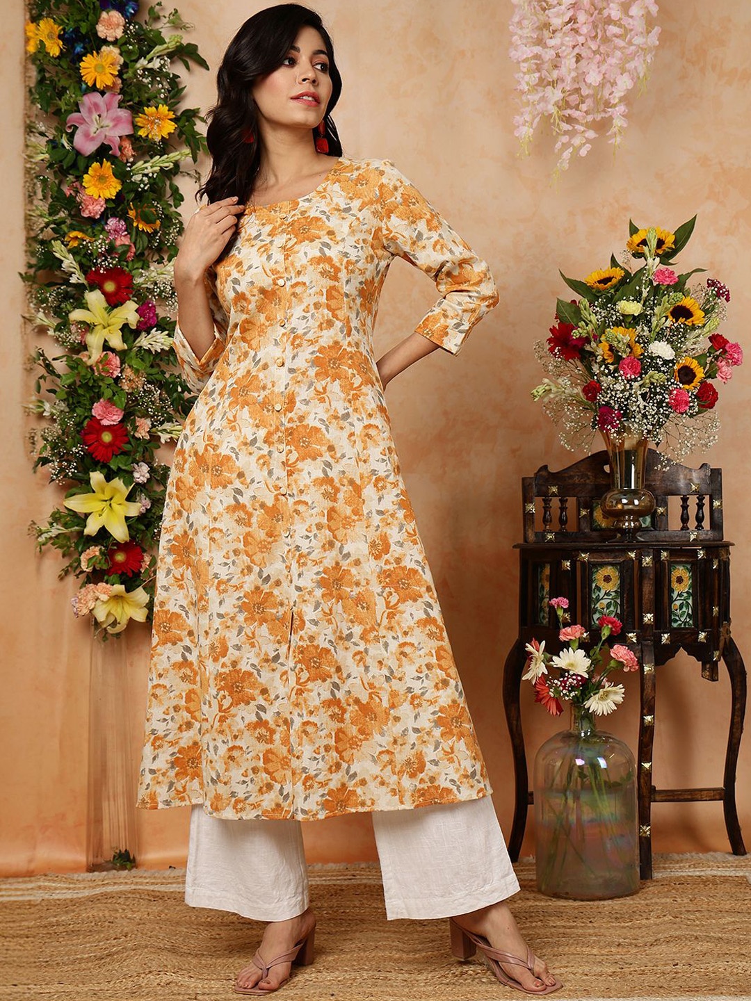 

KIMAYRA Floral Printed A-Line Kurta, Mustard