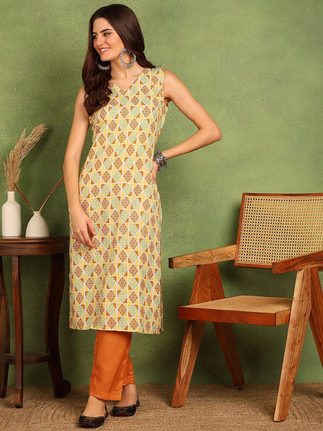 

DSK STUDIO Geometric Printed V Neck Straight Kurta With Trouser, Mustard