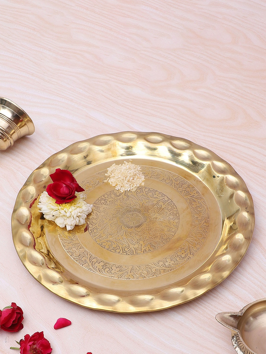 

Two Moustaches Gold Toned Textured Brass Pooja Thali