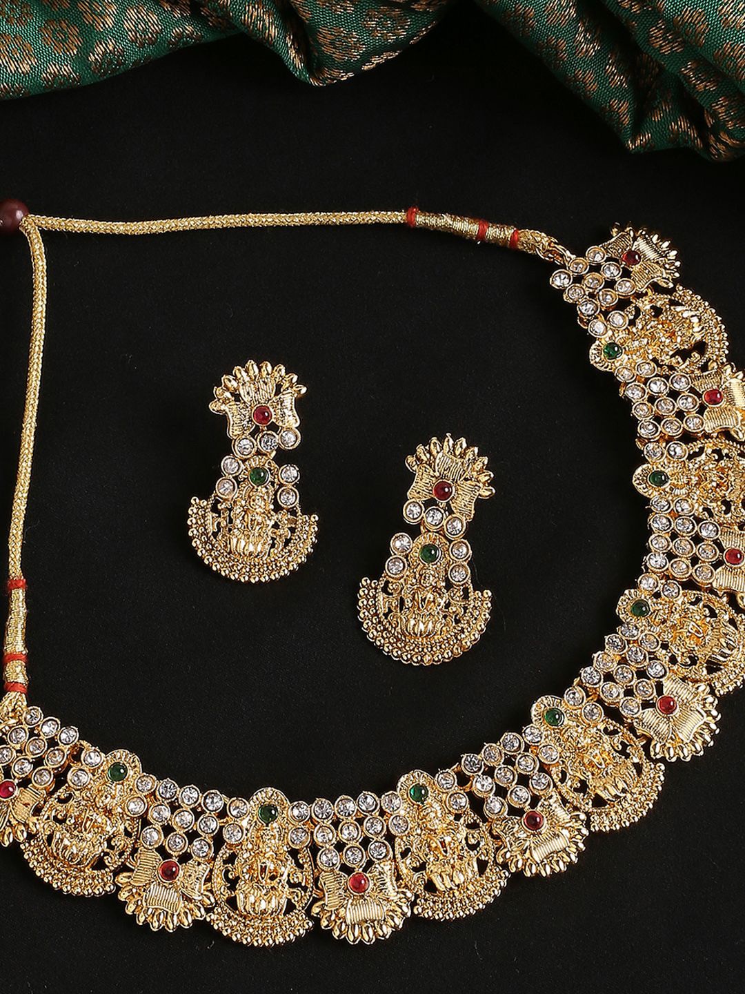 

Anouk Gold Toned Stone Studded Temple Jewellery Set