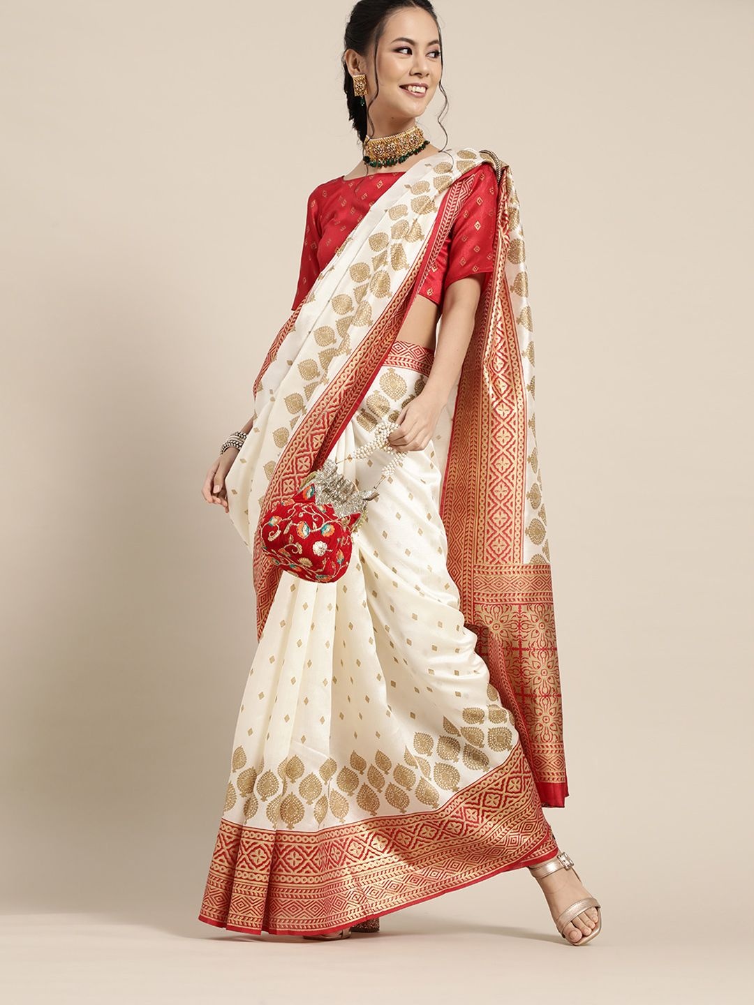 

Saree mall Ethnic Motifs Silk Blend Patola Sarees, Cream