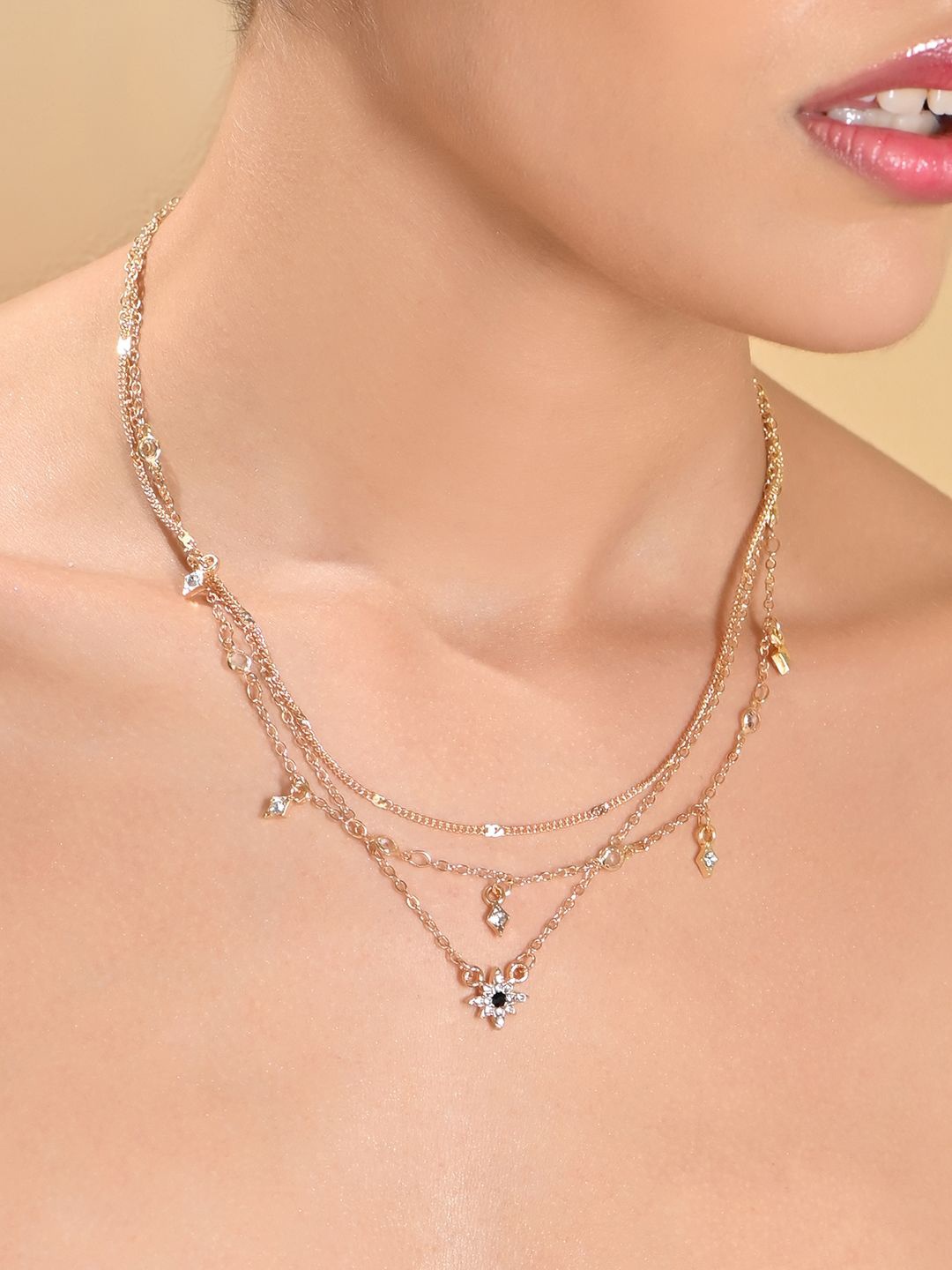 

ToniQ Gold-Plated Cubic Zirconia Studded Layered Necklace