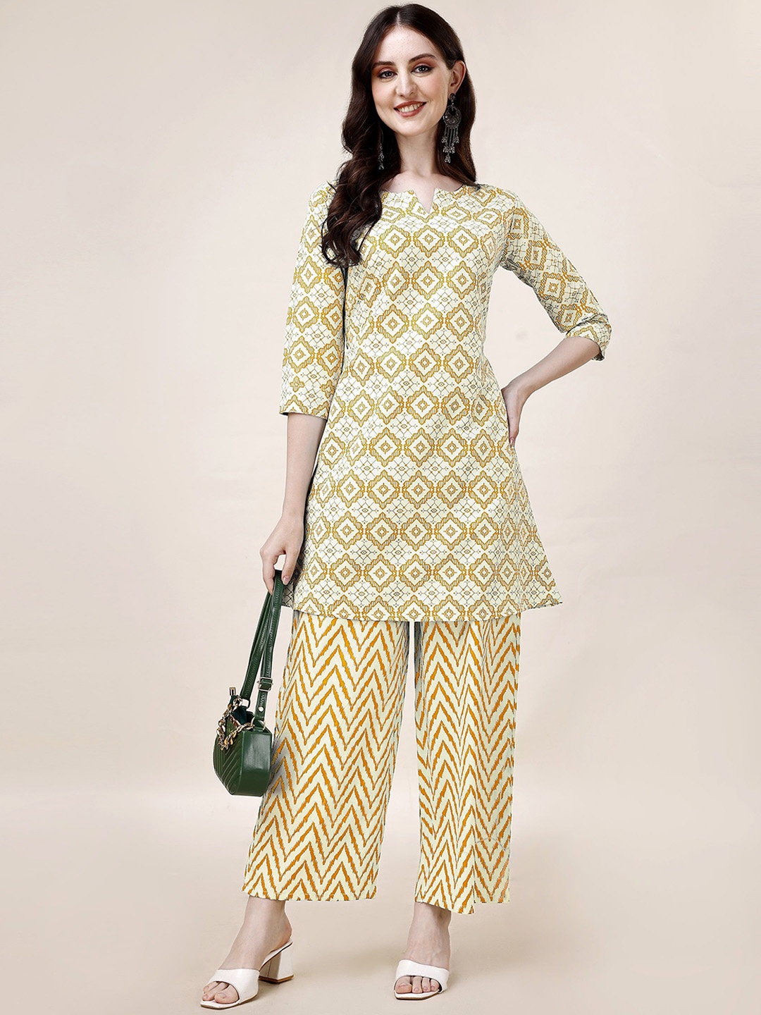 

Growdamy Women Printed Regular Kurti with Palazzos, Yellow