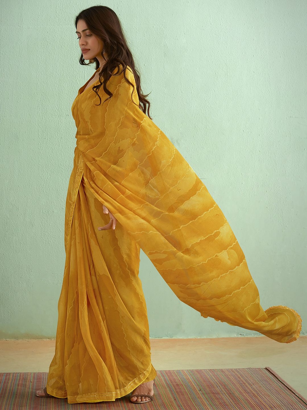 

Saree mall Striped Sequinned Sarees, Yellow