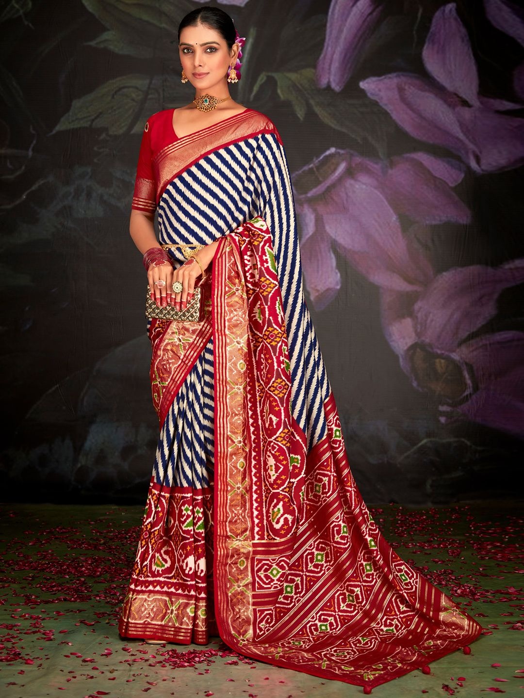 

Saree mall Striped Zari Silk Blend Patola Navy Blue Sarees