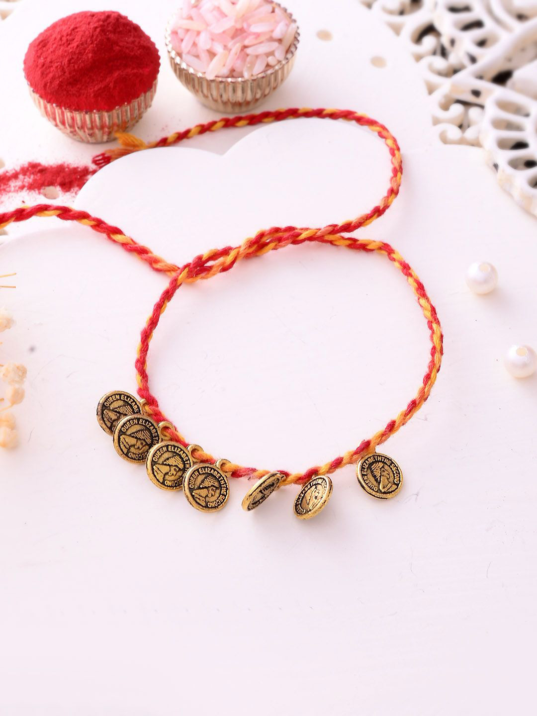 

Aapno Rajasthan Coined Thread Rakhi With Roli Chawal & Greeting Card, Gold