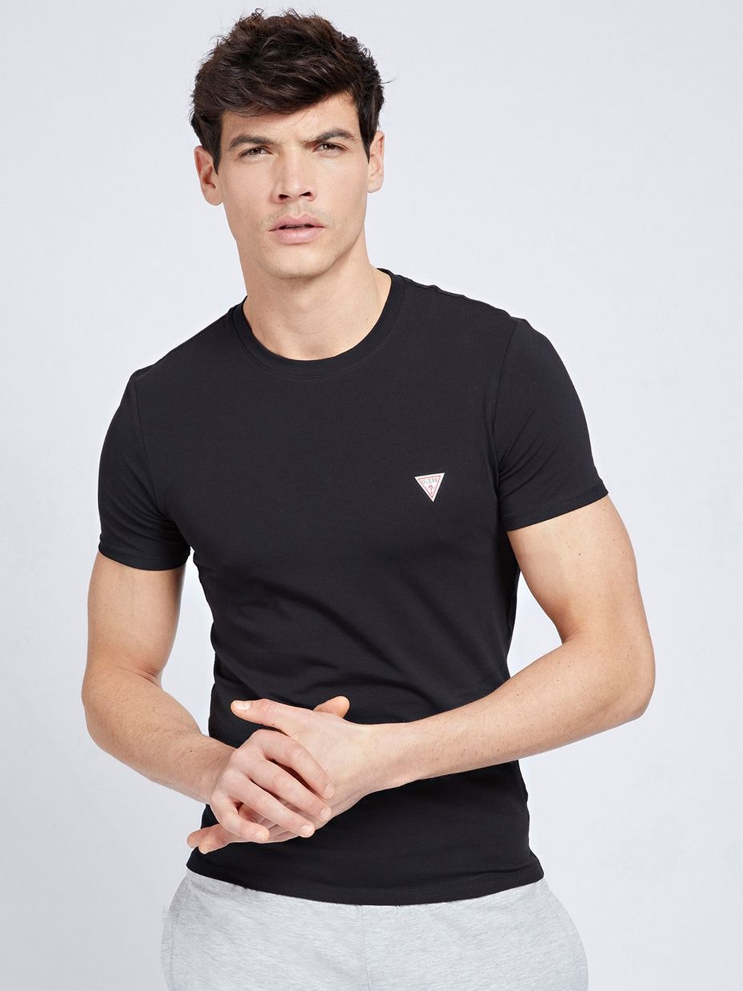 

GUESS Men Solid T-shirt, Black