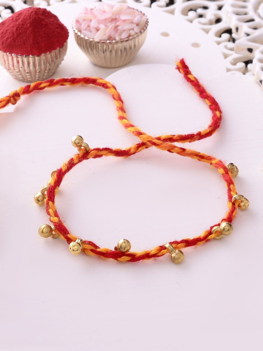 

Aapno Rajasthan Beaded Rakhi With Roli Chawal & Greeting Card, Gold