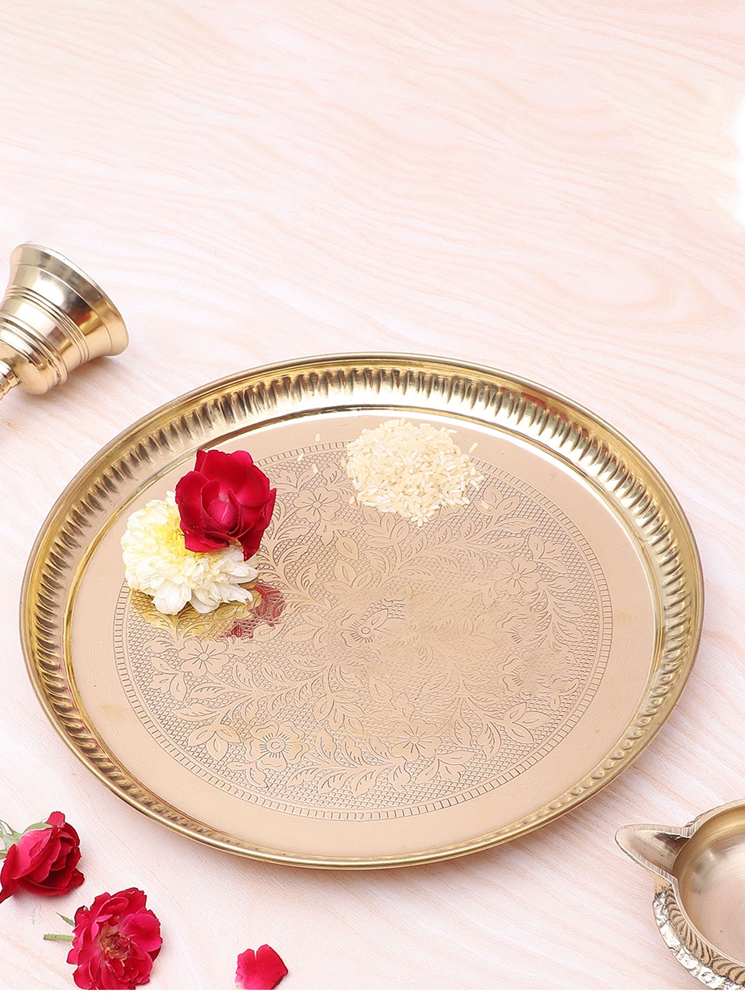 

Two Moustaches Gold Toned Floral Carved Textured Brass Pooja Thali