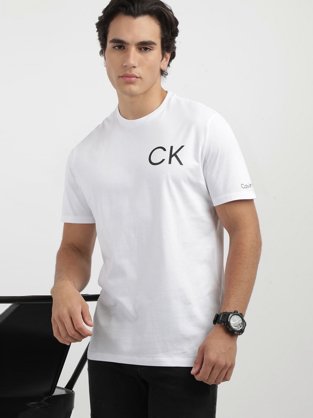 

Calvin Klein Jeans Men Solid Round Neck Cotton T-shirt, White