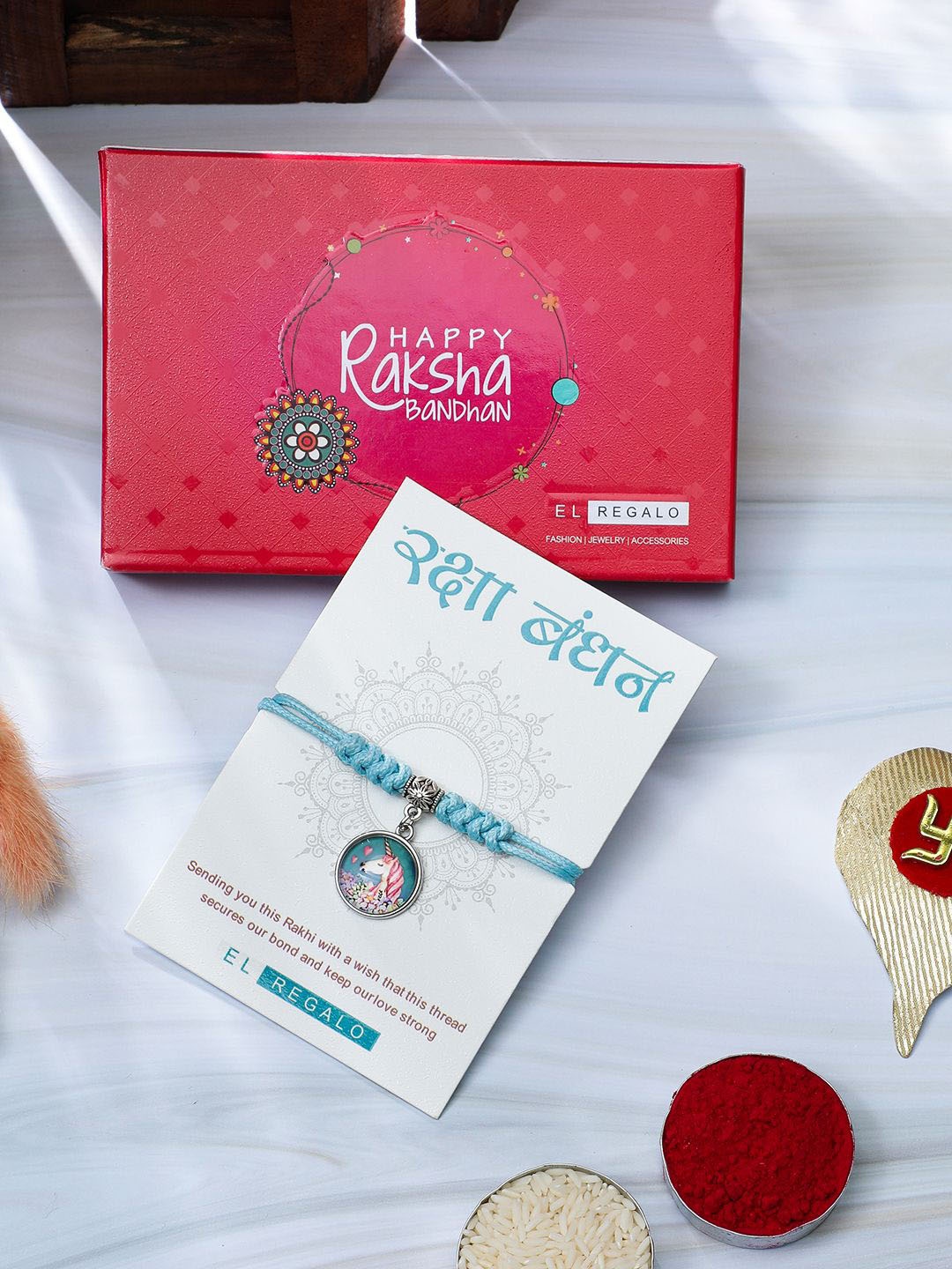 

EL REGALO Braided Charm Thread Rakhi, Blue