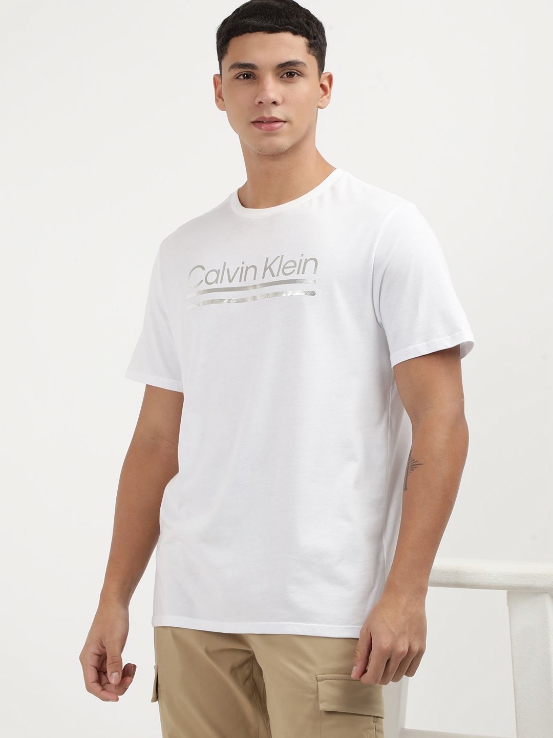 

Calvin Klein Jeans Men Typography Printed Round Neck Cotton T-shirt, White