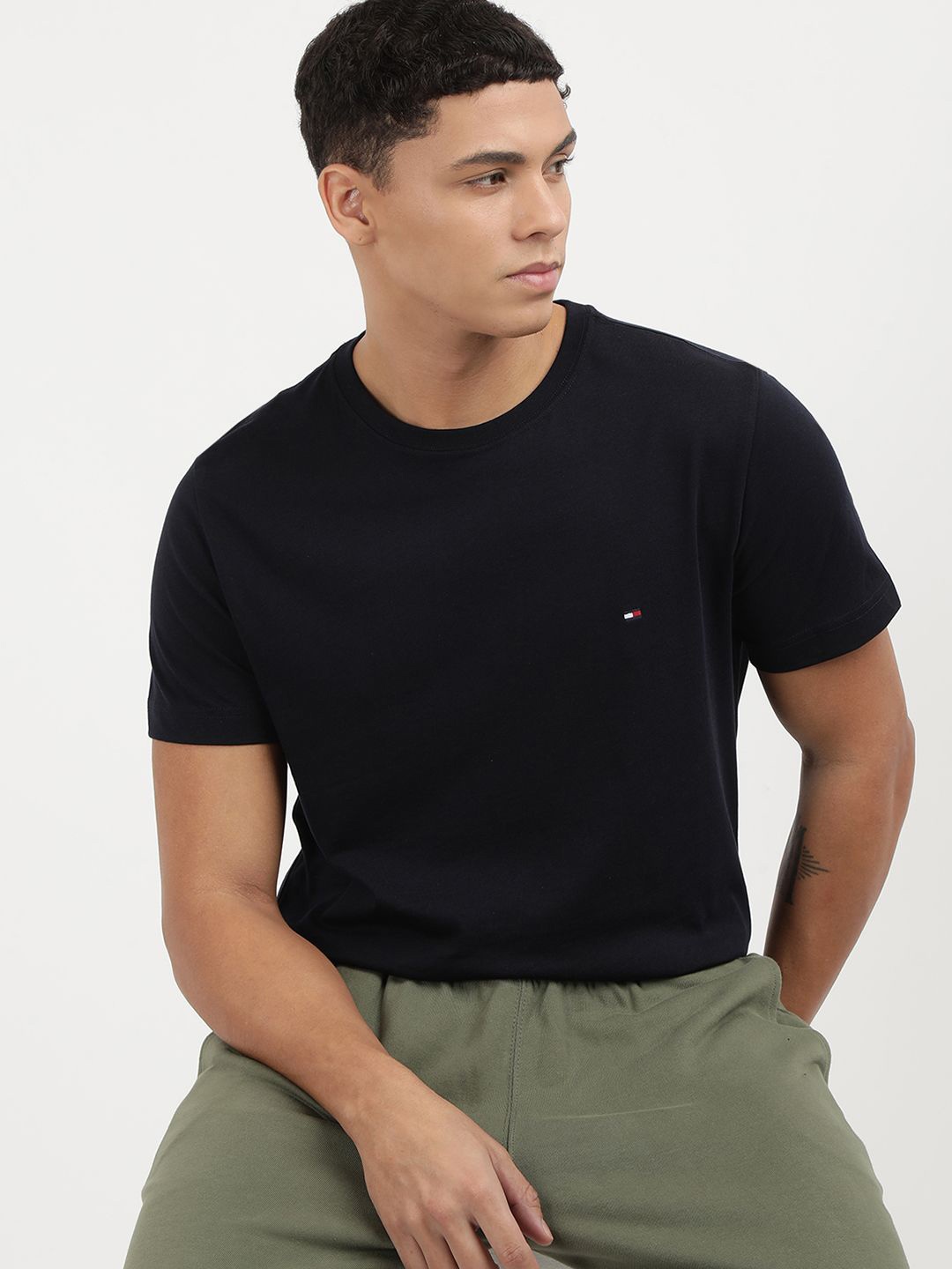 

Tommy Hilfiger Men Solid Round Neck Cotton Slim Fit T-shirt, Navy blue