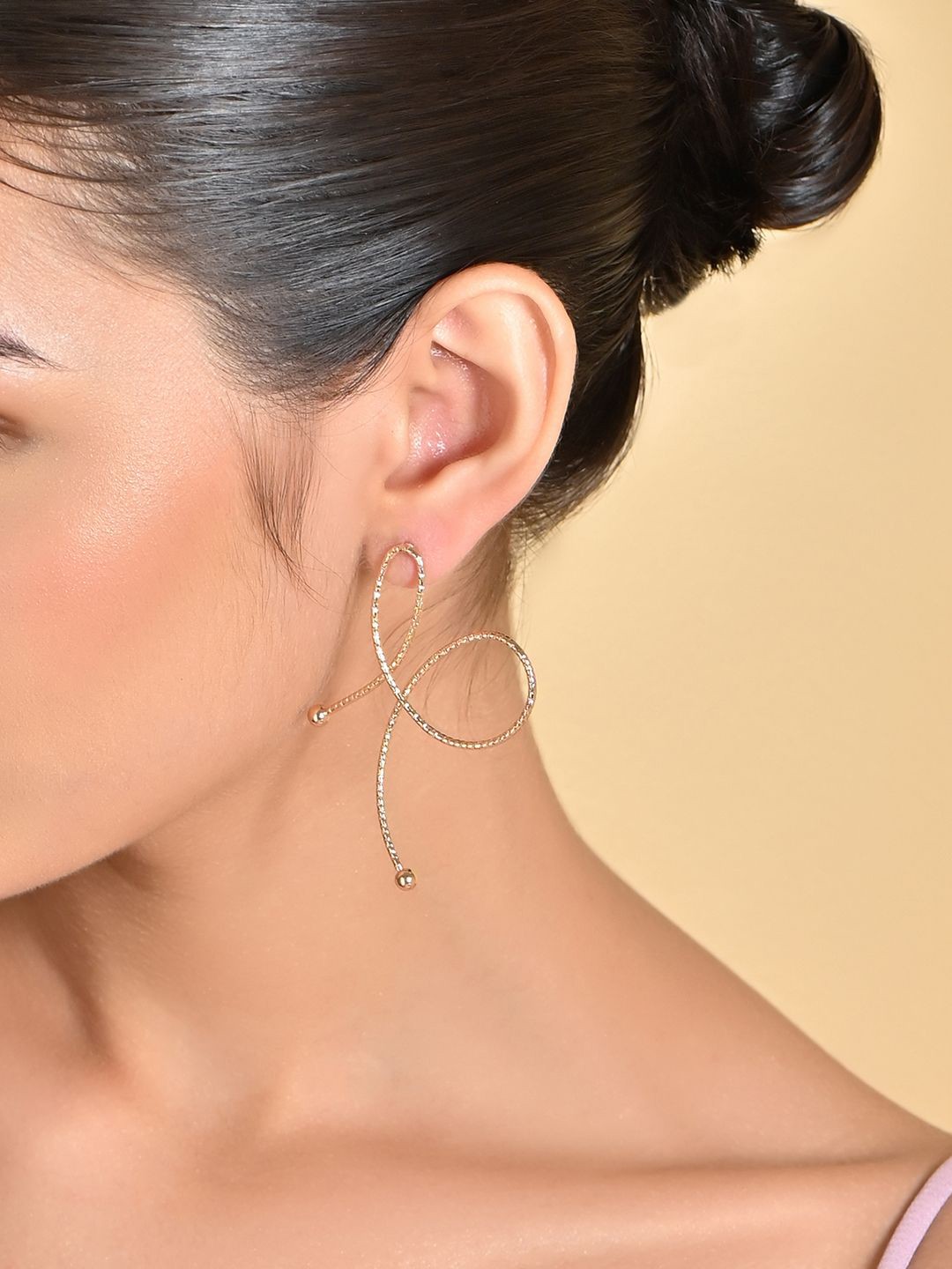 

ToniQ Gold-Plated Contemporary Bow Drop Earrings