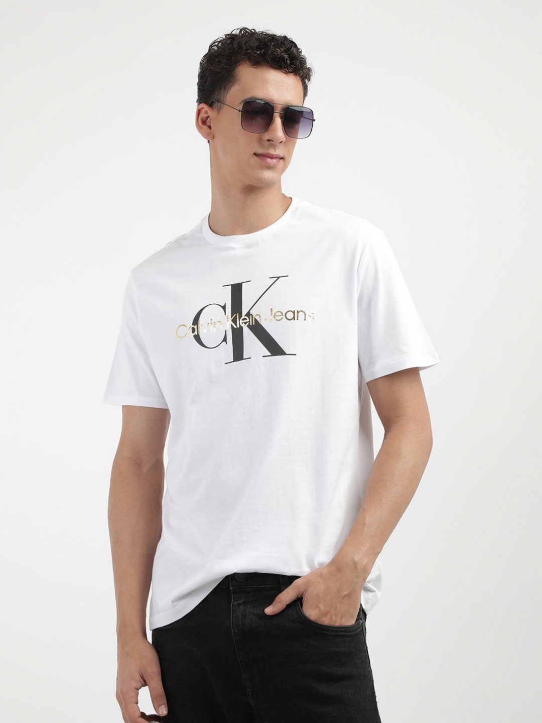 

Calvin Klein Jeans Men Typography Printed Round Neck Cotton T-shirt, White