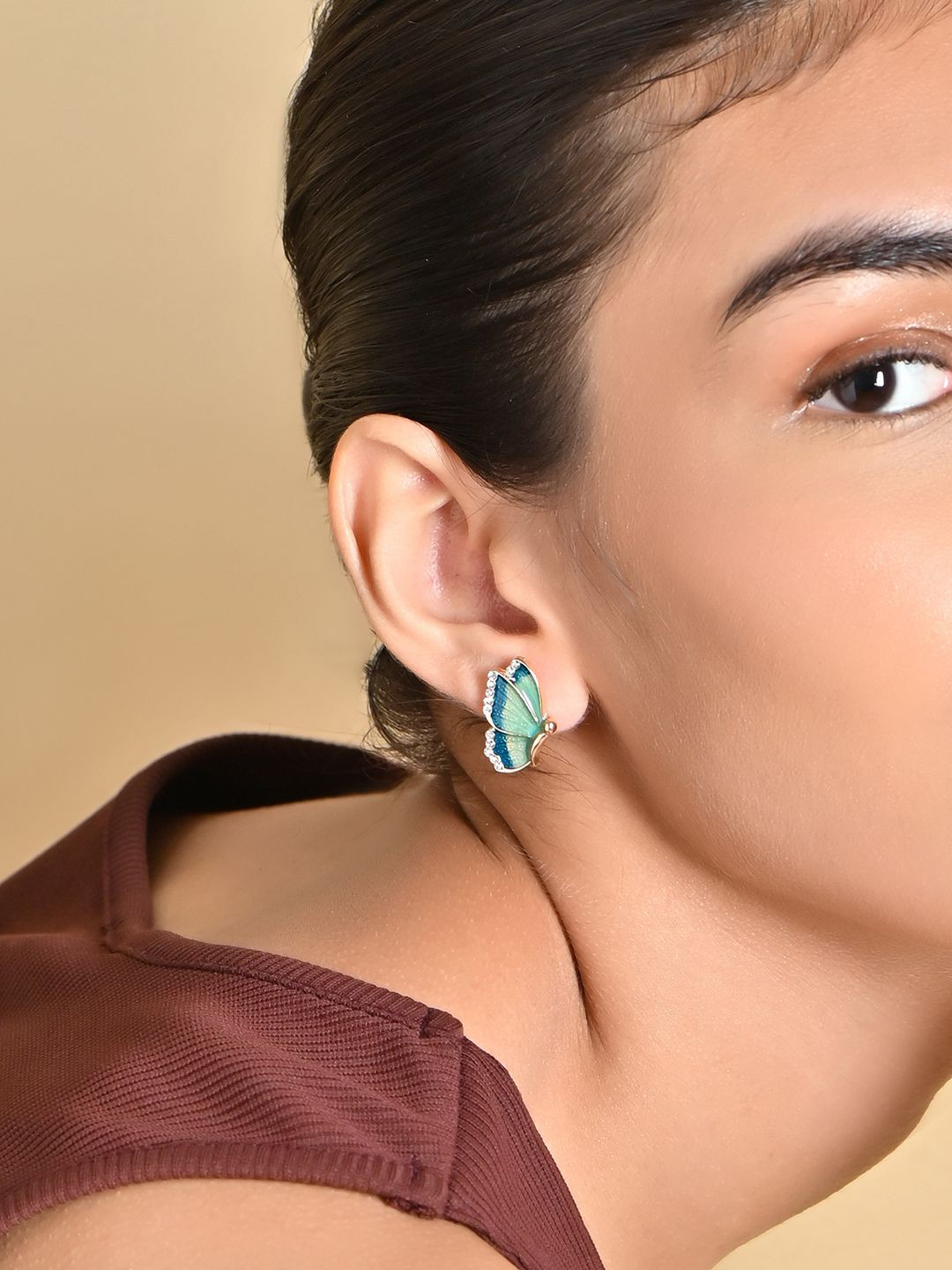

ToniQ Gold-Plated Butterfly Stone Studded Studs Earrings