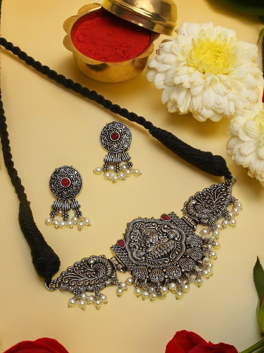 

Sangria Silver-Toned Stone-Studded & Beaded Oxidised Laxmi Temple Jewellery Set