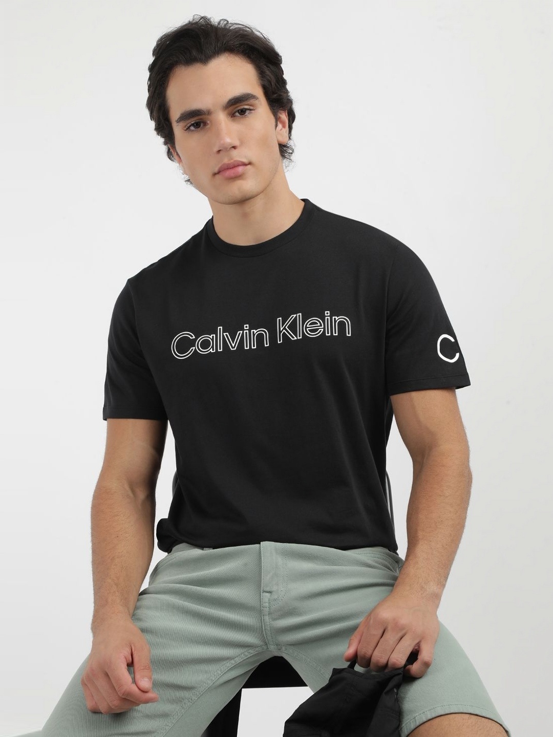 

Calvin Klein Jeans Men Typography Printed Round Neck Cotton T-shirt, Black